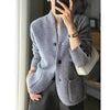 S / Gris