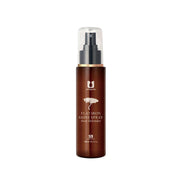 Spray protettivo capelli Argan, 100ml. Flacone marrone con erogatore nero, ideale per protezione calore e lucentezza capelli.