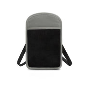Zaino antifurto grigio e nero, design minimalista, tasca frontale in rete, spallacci regolabili, ideale per viaggi e uso quotidiano.