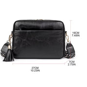 Borsa a tracolla nera in pelle sintetica, dimensioni 27x19x7 cm, con dettagli leopardati e nappina. Elegante e versatile per ogni occasione.