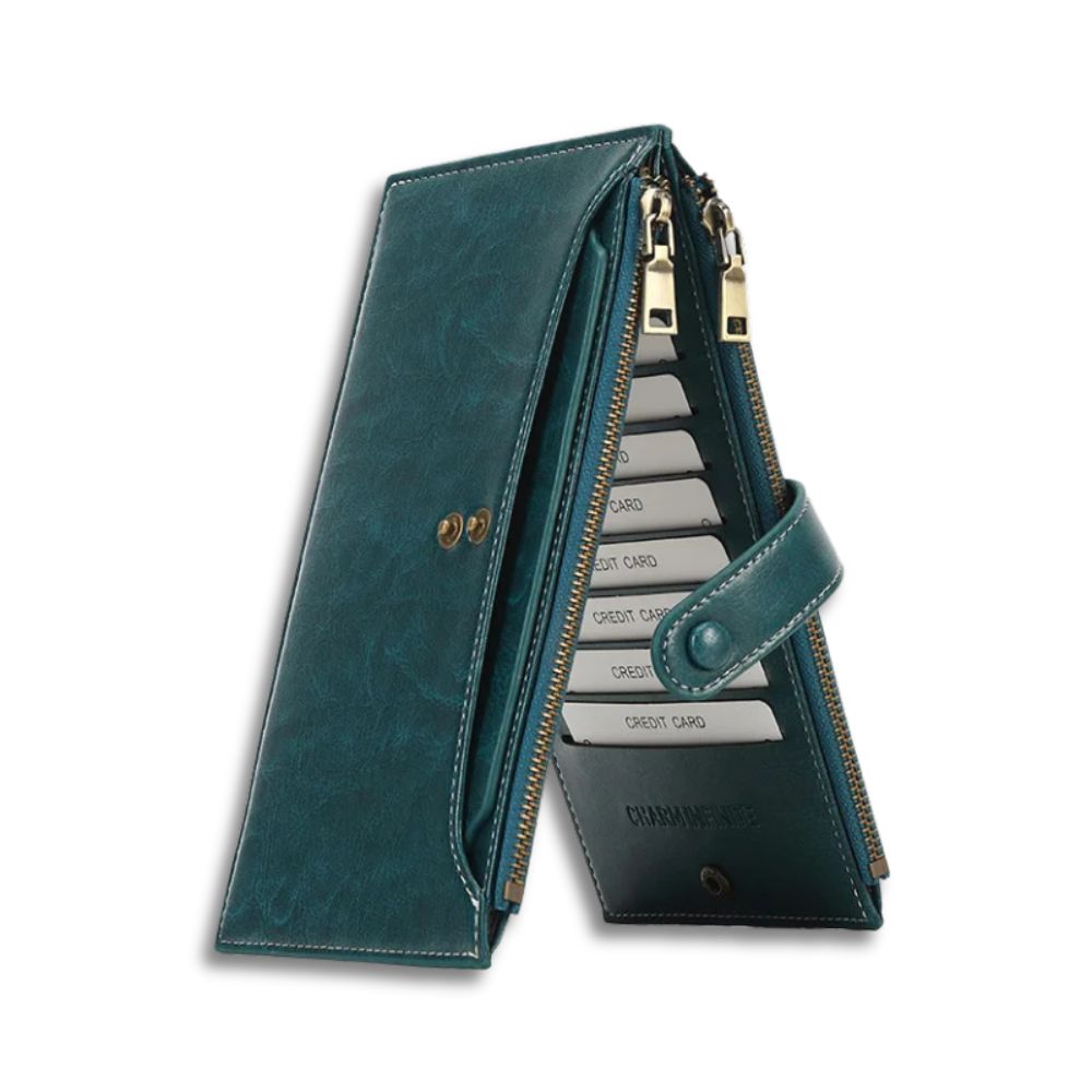 Portafoglio donna in pelle verde con chiusura a zip, scomparti per carte di credito e tasca portamonete. Design elegante e funzionale.