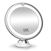 Specchio cosmetico ingrandimento 10x, rotondo, con luce LED, montatura argento, base stabile, ideale per trucco e cura del viso.