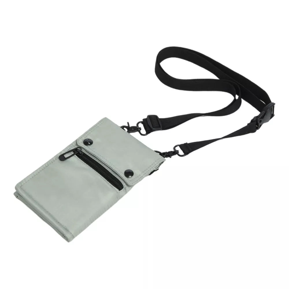 Borsa a tracolla grigia unisex con cerniera e bottoni, tracolla regolabile nera, ideale per viaggi e uso quotidiano. Accessorio moda pratico.