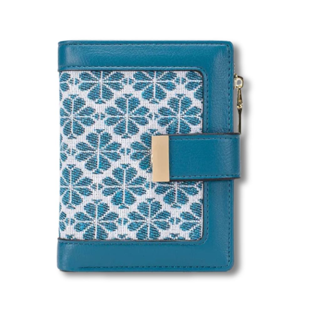 Portafoglio donna in pelle blu con motivo geometrico, chiusura a scatto dorata, design elegante e moderno, accessorio moda di tendenza.