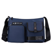 Borsa a tracolla blu scuro unisex, design moderno con tasche multiple, chiusura a zip, ideale per lavoro e viaggio. Materiale resistente all'acqua.