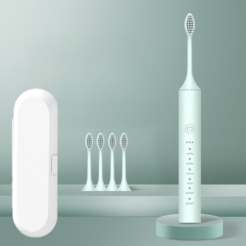 Spazzolino elettrico bianco con custodia e quattro testine di ricambio, design moderno, funzioni multiple, ideale per igiene orale avanzata.