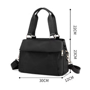 Borsa a tracolla nera da donna, dimensioni 30x12x23 cm, con manici e tracolla regolabile. Design elegante e spazioso, ideale per l'uso quotidiano.