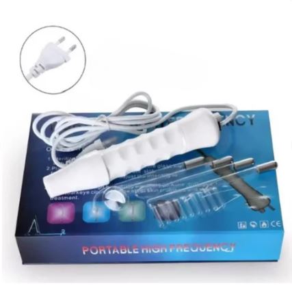 Dispositivo portatile ad alta frequenza per trattamenti estetici, con manico ergonomico bianco e cavo, su scatola blu. Adatto per cura della pelle.