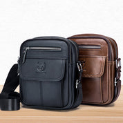 Due borse a tracolla in pelle, una nera e una marrone, con cerniere e logo, su sfondo bianco. Accessori moda uomo eleganti e pratici.