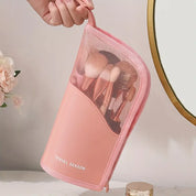 Astuccio da viaggio rosa per trucchi con pennelli, design a rete, ideale per organizzare cosmetici. Accessorio essenziale per il make-up.