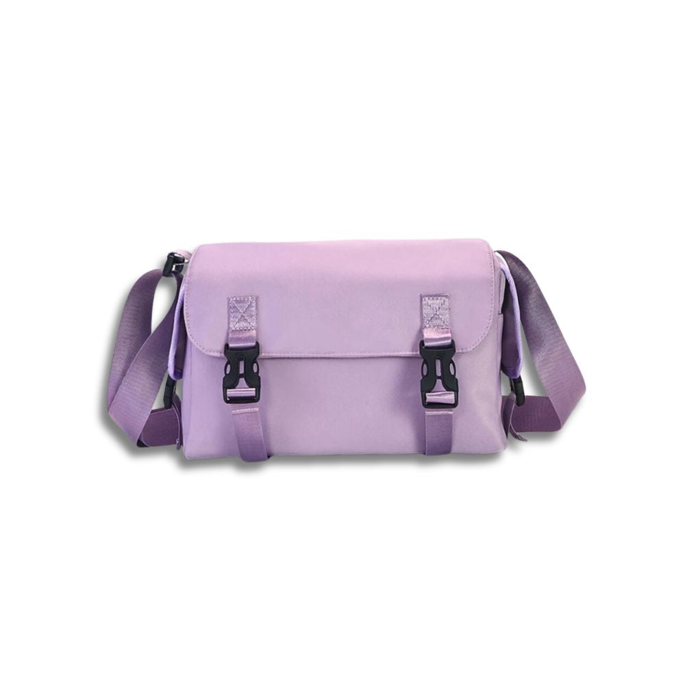 Borsa a tracolla viola in tessuto, design moderno con fibbie nere, ideale per moda casual e uso quotidiano. Accessorio versatile e trendy.