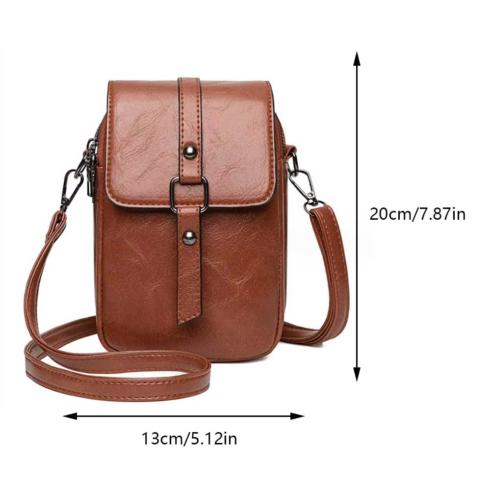 Borsa a tracolla in pelle marrone, dimensioni 20x13 cm, con chiusura a fibbia e tracolla regolabile. Elegante e pratica per uso quotidiano.
