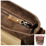 Borsa a tracolla in tela marrone con cerniera robusta e dettagli in pelle, ideale per uomo, stile vintage, perfetta per lavoro o viaggio.