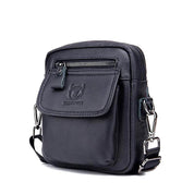 Borsa a tracolla in pelle nera da uomo, design compatto con tasca frontale e zip, ideale per viaggi e uso quotidiano. Accessorio moda elegante.