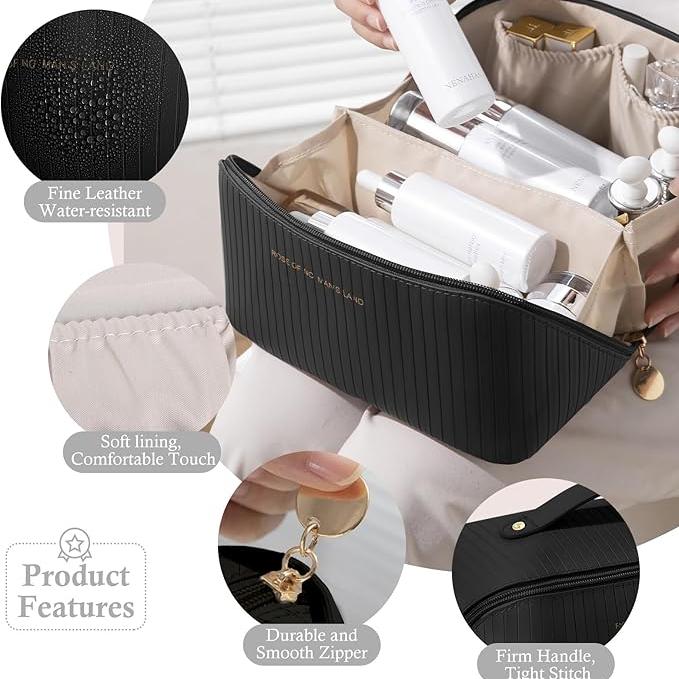 Elegante borsa cosmetica nera in pelle resistente all'acqua, con cerniera robusta e fodera morbida. Ideale per organizzare prodotti di bellezza.