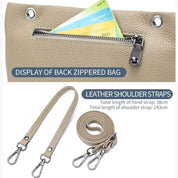 Borsa in pelle beige con cerniera posteriore, tasca per carte, tracolla regolabile, ganci metallici. Lunghezza tracolla: 143 cm.