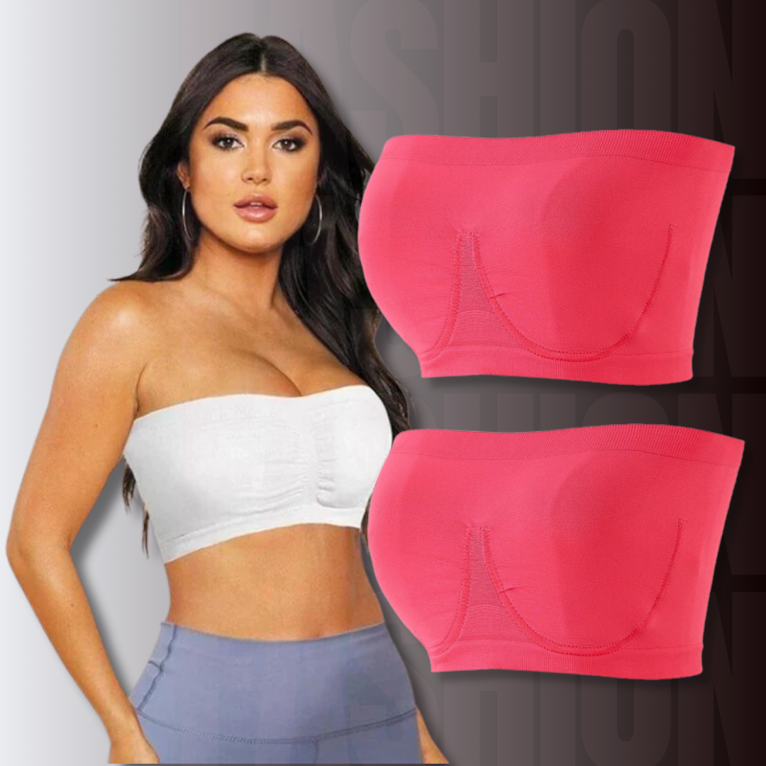 Modella con top bianco senza spalline, accanto a due reggiseni sportivi rossi senza cuciture. Intimo donna comodo, moda fitness.