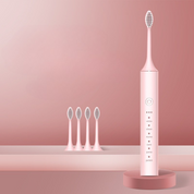 Spazzolino elettrico rosa con testine di ricambio, design moderno, funzioni multiple per sbiancamento e pulizia dentale. Accessorio bagno elegante.