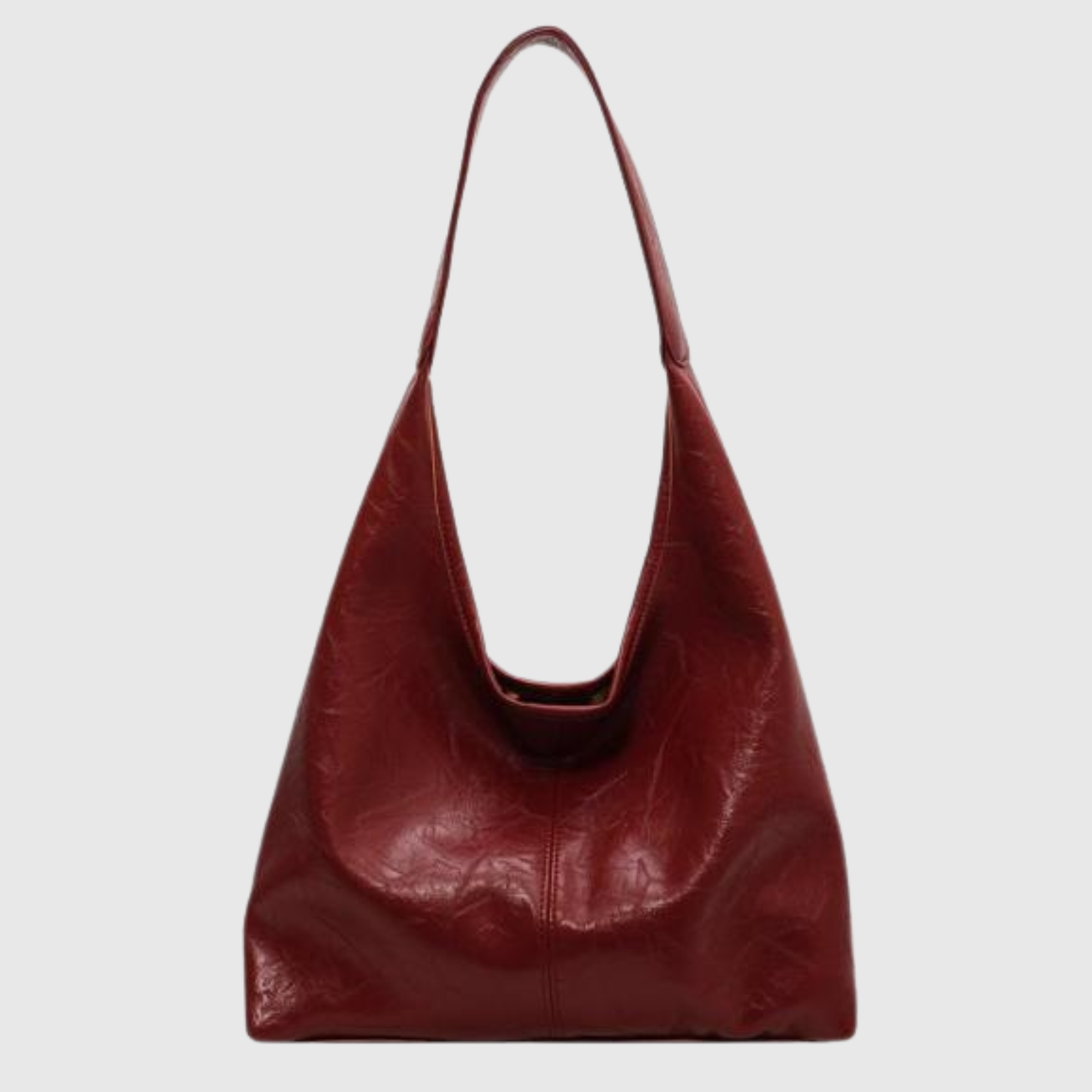Borsa a spalla in pelle rossa, design minimalista, elegante e spaziosa. Accessorio moda donna, ideale per uso quotidiano e occasioni speciali.