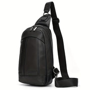 Zaino monospalla in pelle nera, design elegante e moderno, con cerniere multiple e tracolla regolabile. Ideale per uomo, moda e praticità.