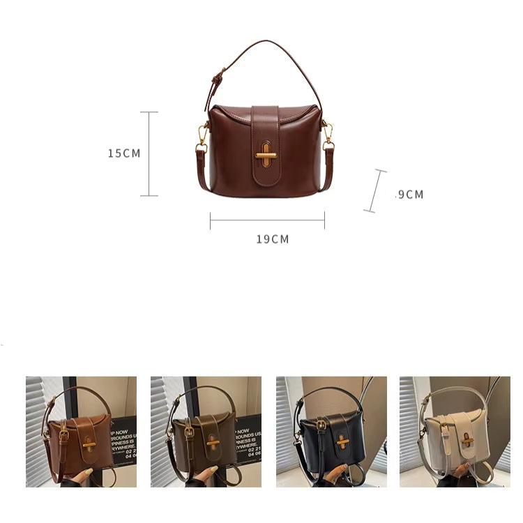 Borsa a tracolla in pelle marrone, dimensioni 19x15x9 cm, con chiusura a fibbia dorata. Disponibile in vari colori. Elegante e versatile.