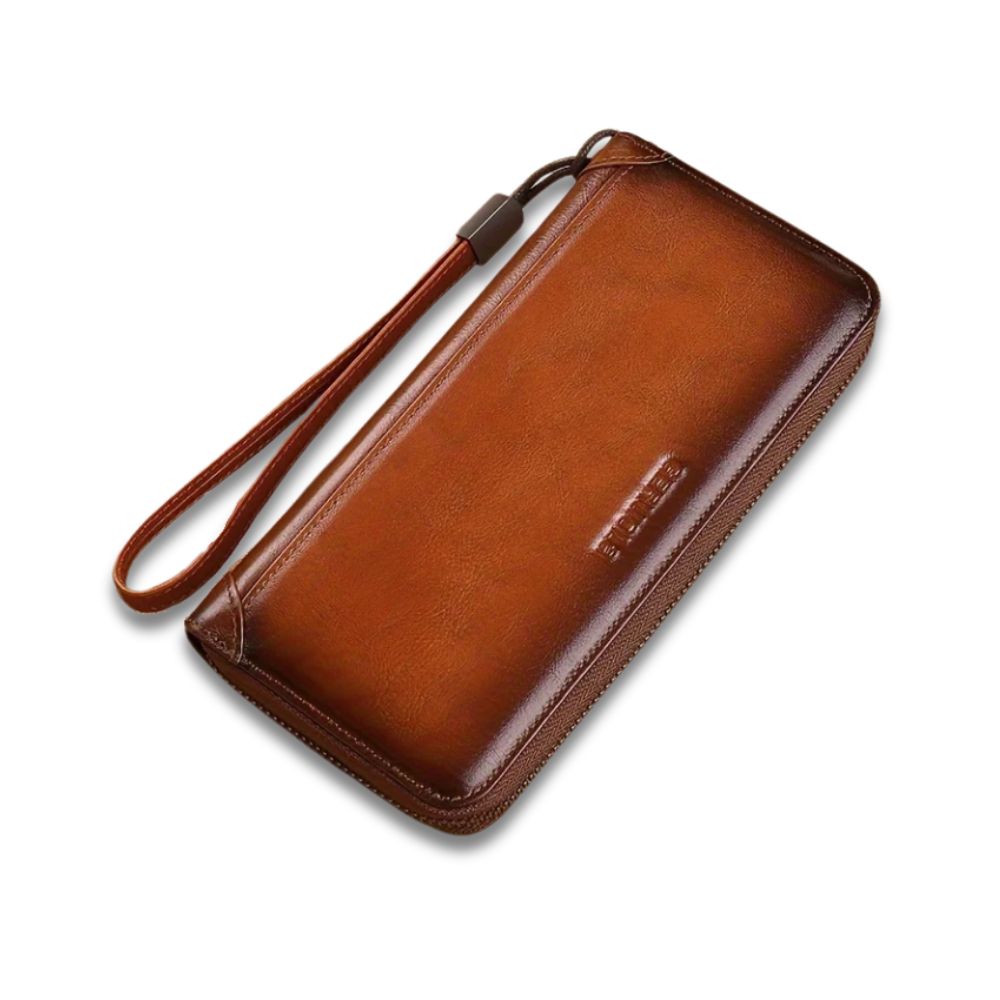 Portafoglio in pelle marrone con cerniera e cinturino da polso, design elegante e funzionale, ideale per uomo e donna. Accessorio moda di qualità.