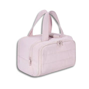 Borsa da viaggio rosa chiaro con doppia cerniera e manici, design compatto e moderno, ideale per viaggi e uso quotidiano.