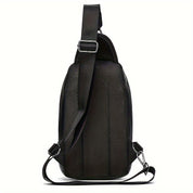 Zaino monospalla nero in pelle e tessuto, design moderno, cinturino regolabile, ideale per uomo, perfetto per viaggi e uso quotidiano.