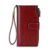 Portafoglio donna in pelle rossa con cinturino, chiusura a bottone, design elegante, ideale per carte e contanti. Accessorio moda di alta qualità.