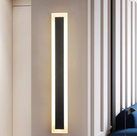 Applique moderna a LED su parete grigia, design minimalista e rettangolare, illuminazione interna elegante, arredamento contemporaneo.