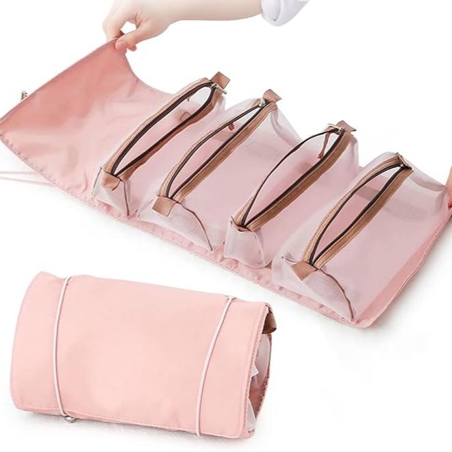 Borsa da viaggio rosa con scomparti trasparenti, design pieghevole, ideale per cosmetici e accessori. Organizzatore compatto e portatile.