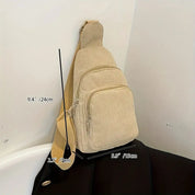 Zaino a tracolla beige in velluto a coste con tasche multiple, dimensioni 24x15x7cm, ideale per moda casual e viaggi urbani.