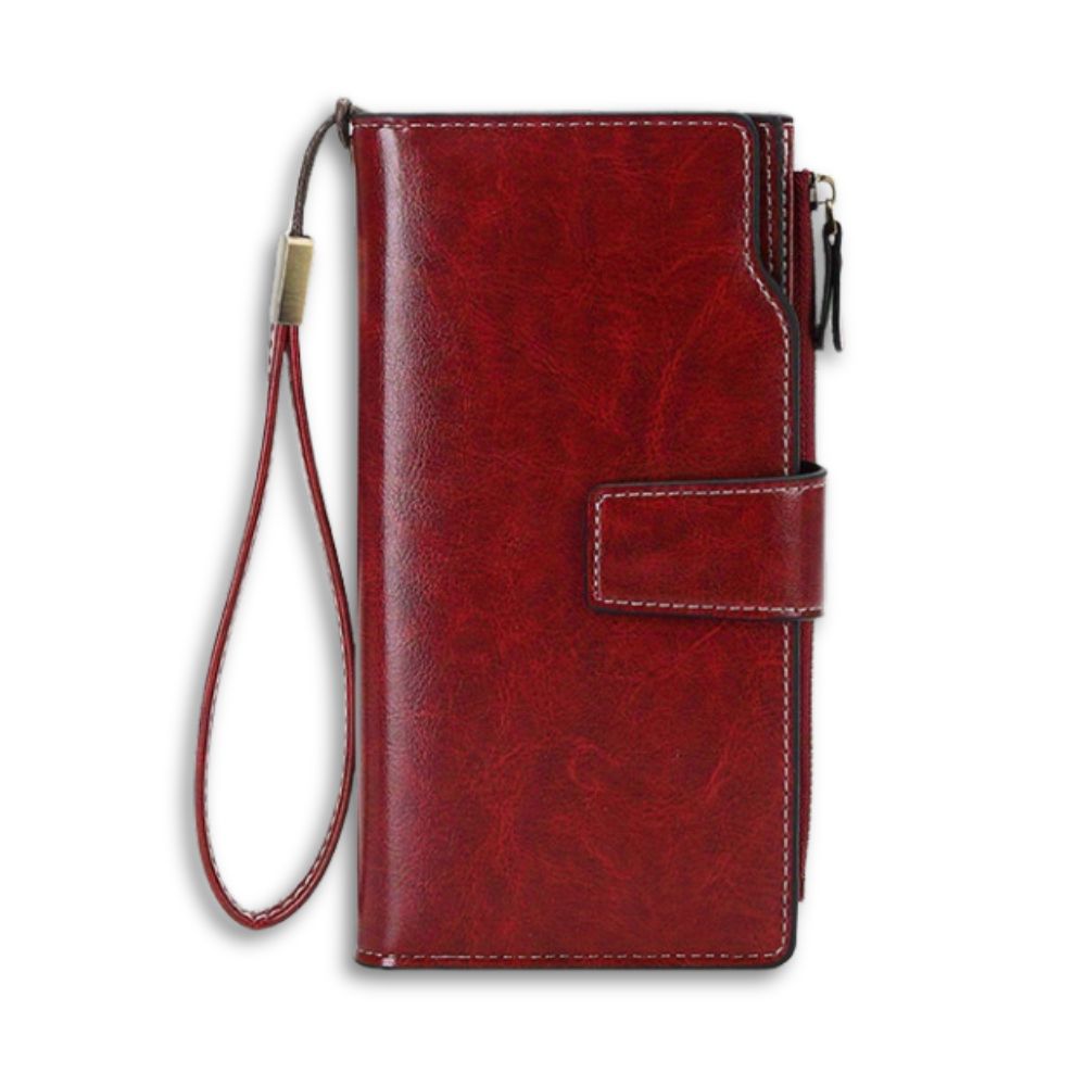 Portafoglio donna in pelle rossa con cinturino, chiusura a bottone, scomparti multipli. Elegante e funzionale accessorio moda.