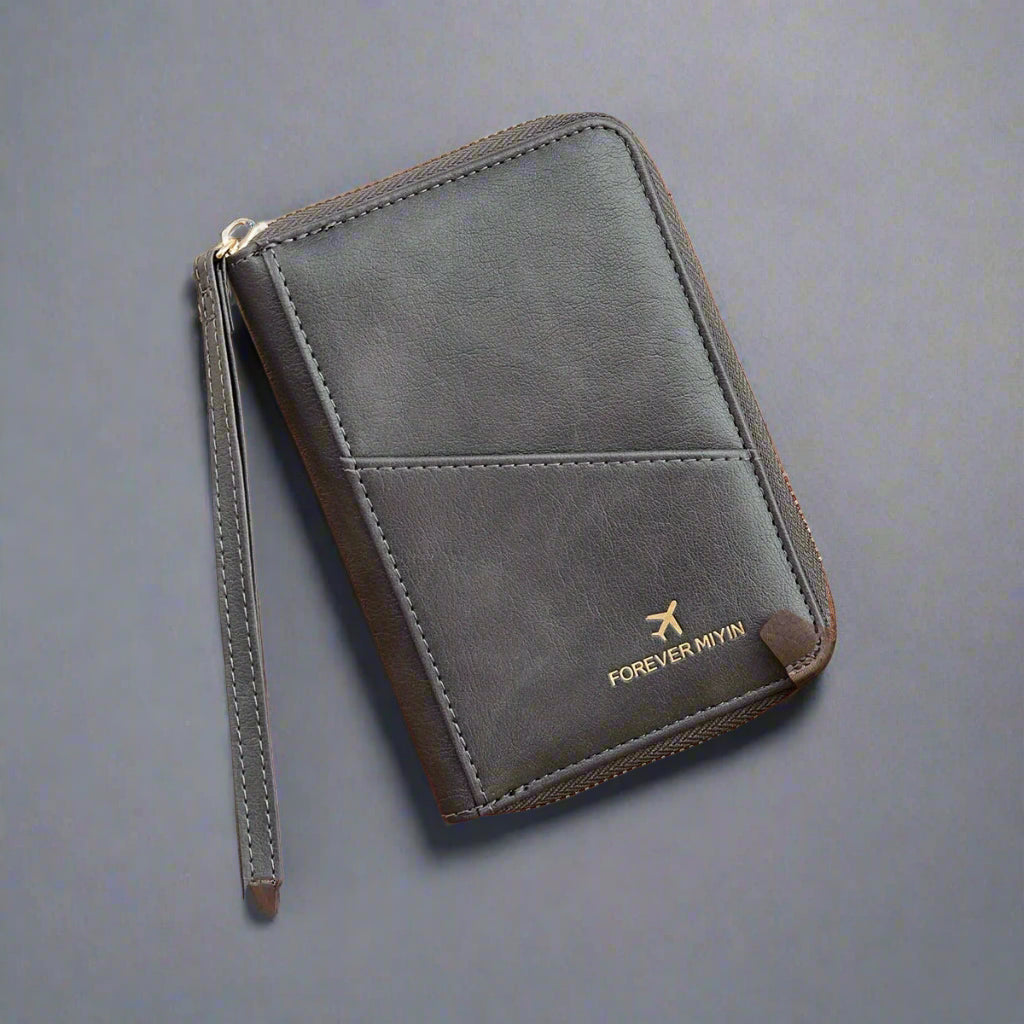 Portafoglio in pelle nera con cerniera, design elegante, logo dorato "FOREVER MYIN", cinturino da polso, accessorio moda uomo e donna.