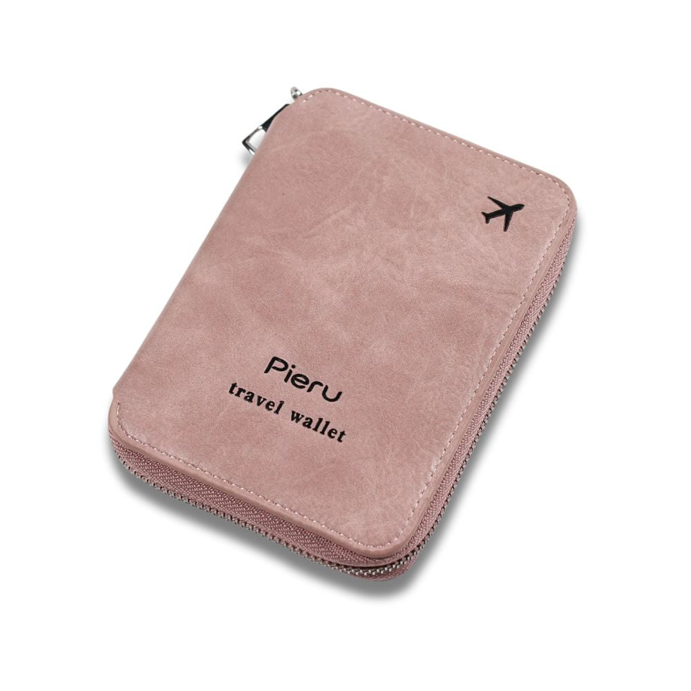 Portafoglio da viaggio rosa in pelle sintetica con cerniera, logo "Pieru" e icona aereo. Accessorio elegante e pratico per documenti e carte.