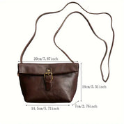 Borsa a tracolla in pelle marrone con fibbia, dimensioni 20x14x7 cm. Elegante e pratica, ideale per moda donna e accessori casual.
