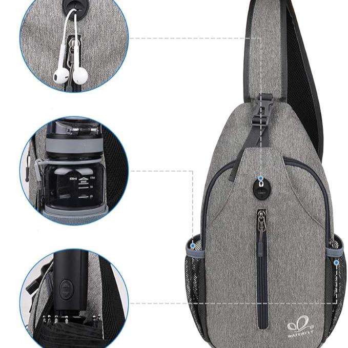 Zaino monospalla grigio con porta USB, tasca per bottiglia, foro per auricolari. Design moderno, ideale per viaggi e attività all'aperto.