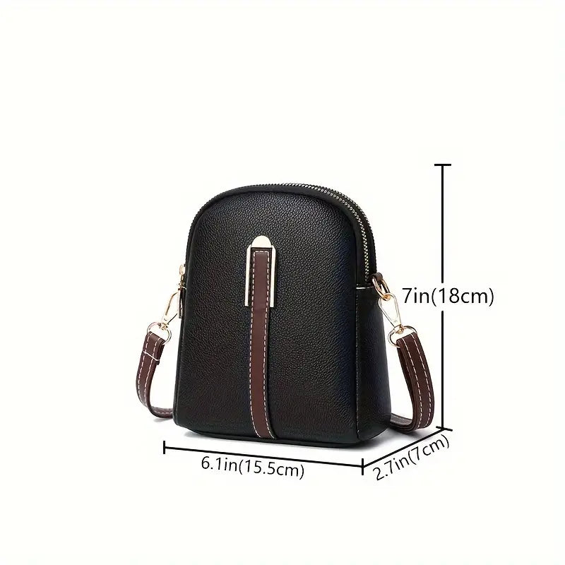Borsa a tracolla in pelle nera con dettagli marroni, dimensioni 18x15.5x7 cm, design elegante e compatto, ideale per moda donna e accessori.