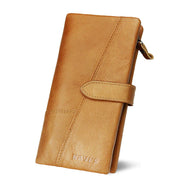 Portafoglio donna in pelle marrone, design elegante con chiusura a bottone, ideale per carte e contanti. Accessorio moda di alta qualità.