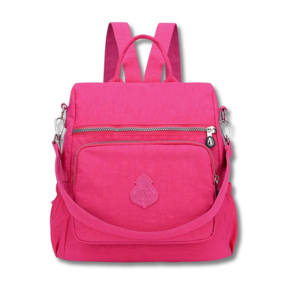 Zaino rosa donna, design moderno, tasche multiple con zip, spallacci regolabili, ideale per scuola e viaggio. Accessorio moda pratico e trendy.