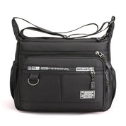 Borsa a tracolla nera unisex, design moderno, tasche multiple con zip, materiale resistente all'acqua, ideale per lavoro e viaggio.