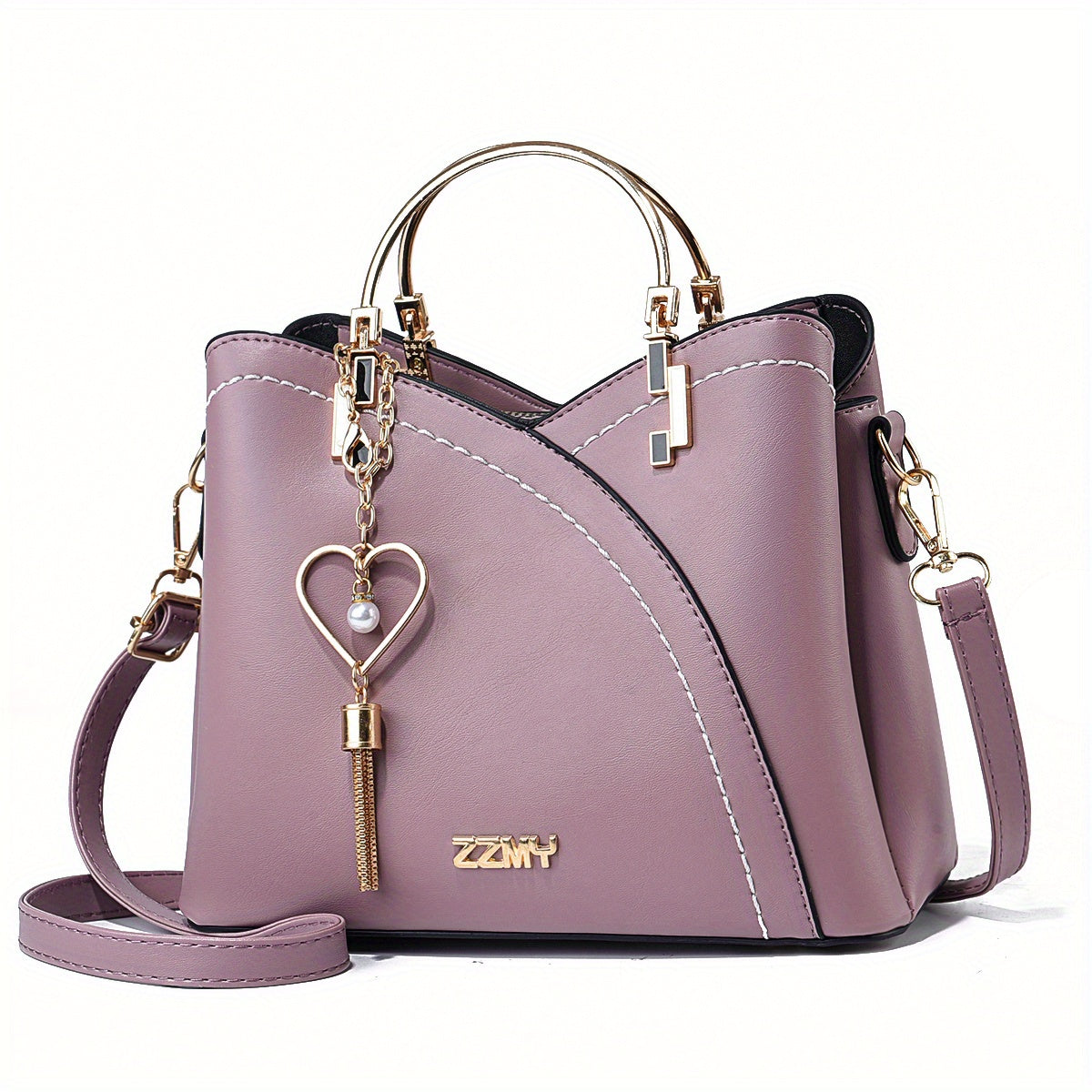 Borsa a tracolla donna in pelle viola con manici dorati, ciondolo a cuore e dettagli eleganti. Accessorio moda chic e versatile.