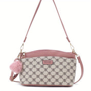 Borsa a tracolla donna in ecopelle rosa con motivo geometrico, ciondolo pompon, chiusura zip, elegante e alla moda, perfetta per ogni occasione.