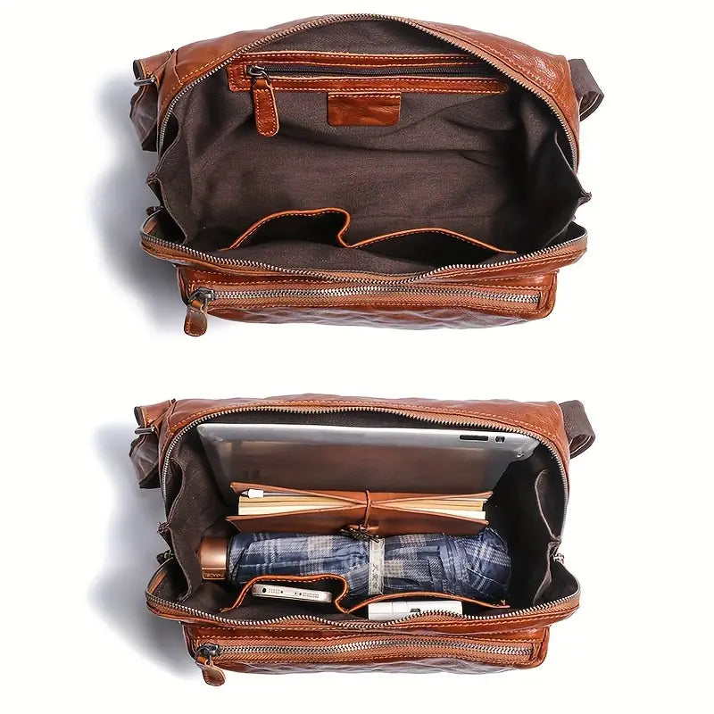 Borsa a tracolla in pelle marrone aperta, con scomparti interni contenenti tablet, libri, ombrello e portafoglio. Design elegante e funzionale.