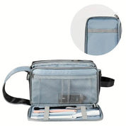 Borsa da viaggio grigia con scomparti multipli, tasca a rete e sezione per spazzolini. Ideale per organizzare accessori da bagno.