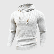 Maglione bianco con cappuccio, design a trama intrecciata, cordini regolabili, maniche lunghe, ideale per moda uomo autunno inverno.