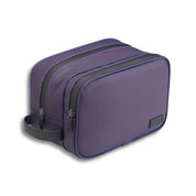 Borsa da toilette viola con doppia cerniera, design elegante e compatto, ideale per viaggi. Accessorio da bagno pratico e resistente.