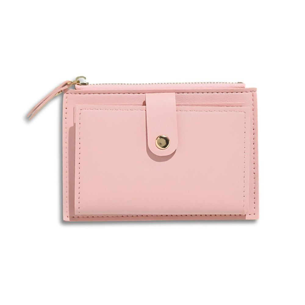 Portafoglio donna in pelle rosa con chiusura a bottone e zip, design elegante e compatto, ideale per carte e contanti. Accessorio moda femminile.
