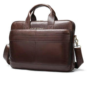 Borsa ventiquattrore in pelle marrone, elegante e professionale, con manici e tracolla regolabile. Ideale per lavoro e ufficio.