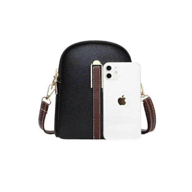 Borsa a tracolla in pelle nera con dettagli marroni, compatibile con smartphone. Design elegante e pratico per moda e tecnologia.